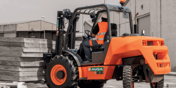AUSA all-terrain forklift at a construction site